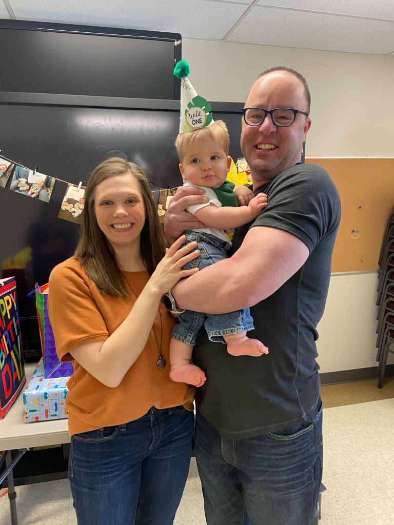 Corey and Jenny Agricola with their son