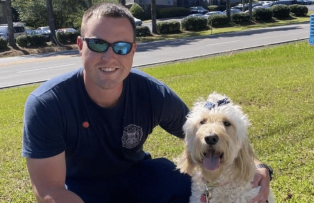 Caleb Andrews, 2022 recipient of the SRC Ambassador of Hope Award, is a 28-year-old firefighter/paramedic with the Vestavia Hills Fire Department, with dog.